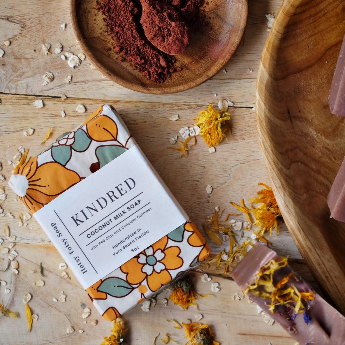 All natural cold process soap colored with Moroccan red clay and scented with clove, cedarwood atlas, scotch pine and patchouli essential oils. Decorated with dried wild flowers. Each bar is wrapped in decorative floral paper with a boutique inspired label.